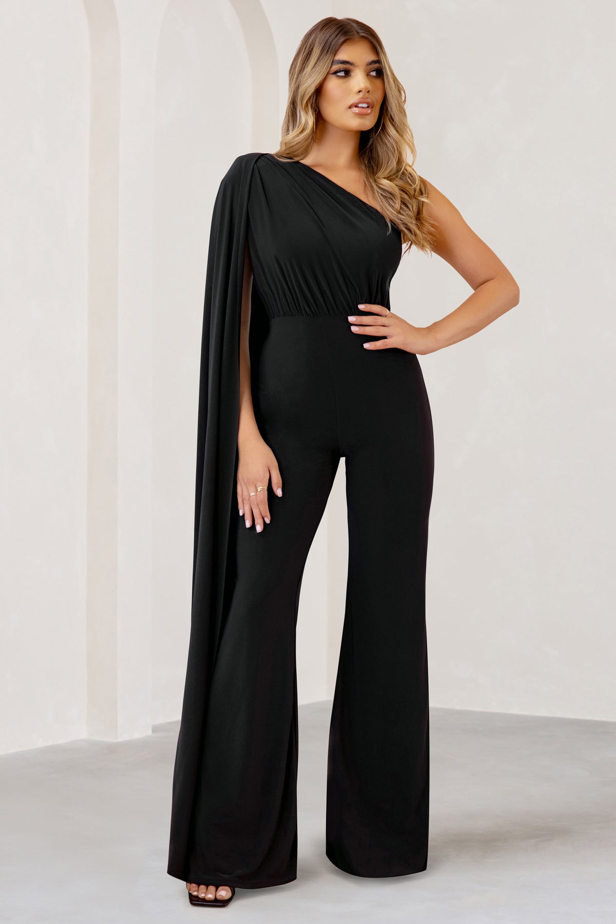 Aurora | Black One Shoulder Cape Sleeve Jumpsuit - Club L 