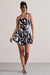 Zahra | Zebra Print Halter-Neck Ruched Mini Dress With Ruffle Hem - Club L 