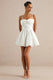 ECM_HR_CL137438110 - Elina _ White Square-Neck Mini Dress With Bow Detail 0.jpg