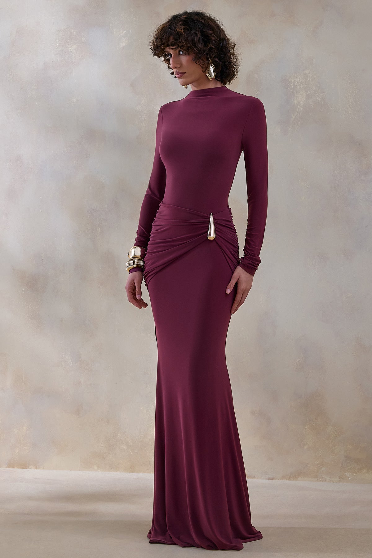 ECM_HR_CL137526102 - Solarium | Burgundy Round-Neck With Gold-Detail And Sash 1.jpg