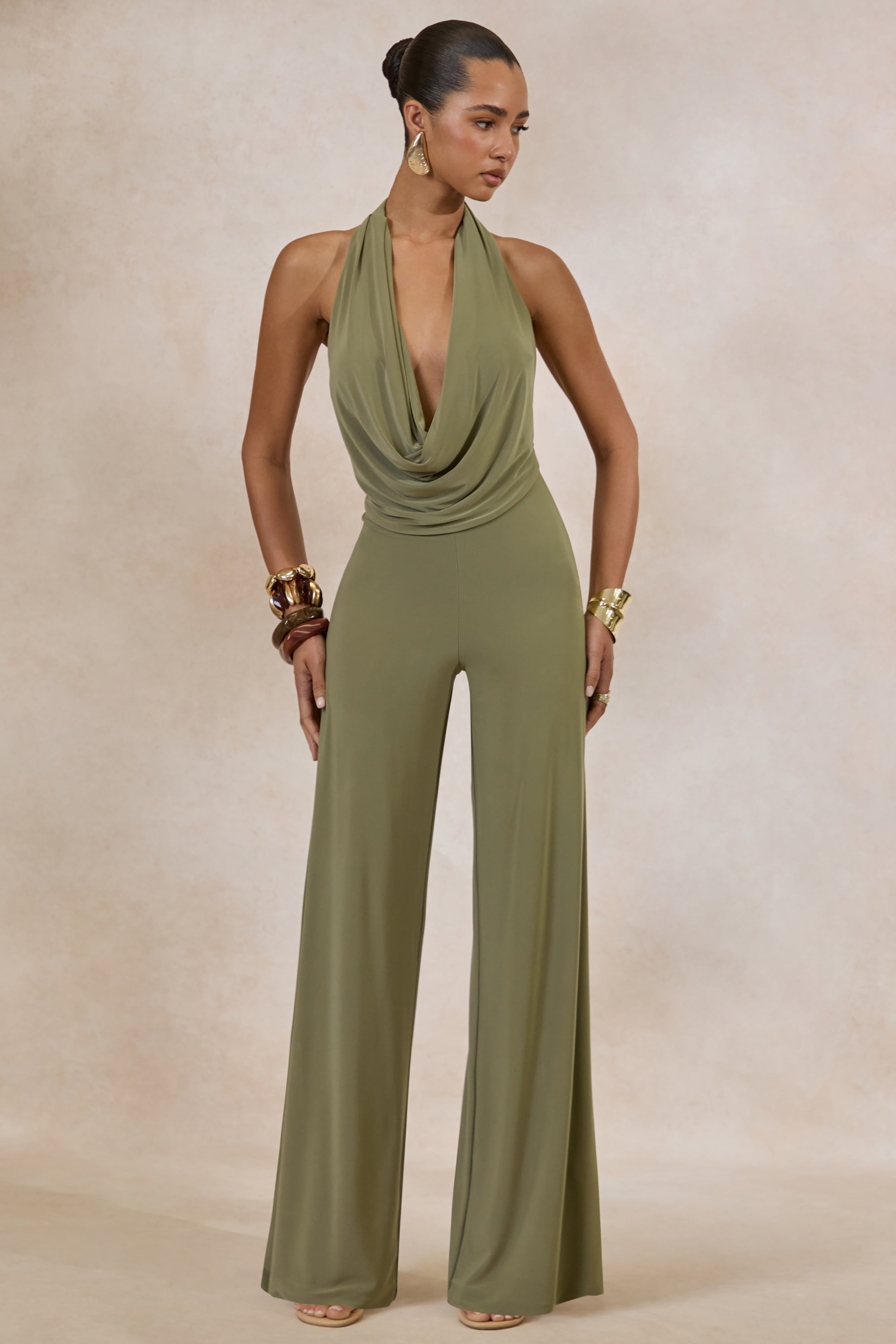 ECM_HR_CL137527037---Clemence-_-Green-Plunge-Neck-Jumpsuit-1.jpg