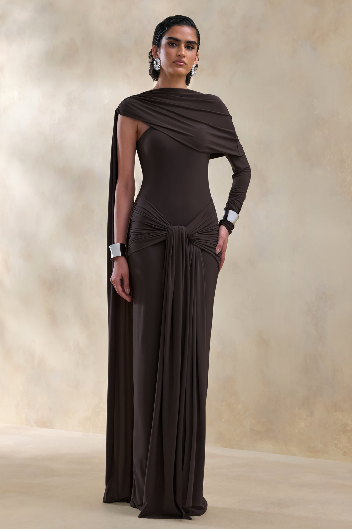 ECM_HR_CL137653022---Trisara-_-Brown-Asymmetric-Neck-Maxi-Dress-With-Gathered-Detailing-And-Sash-0.jpg