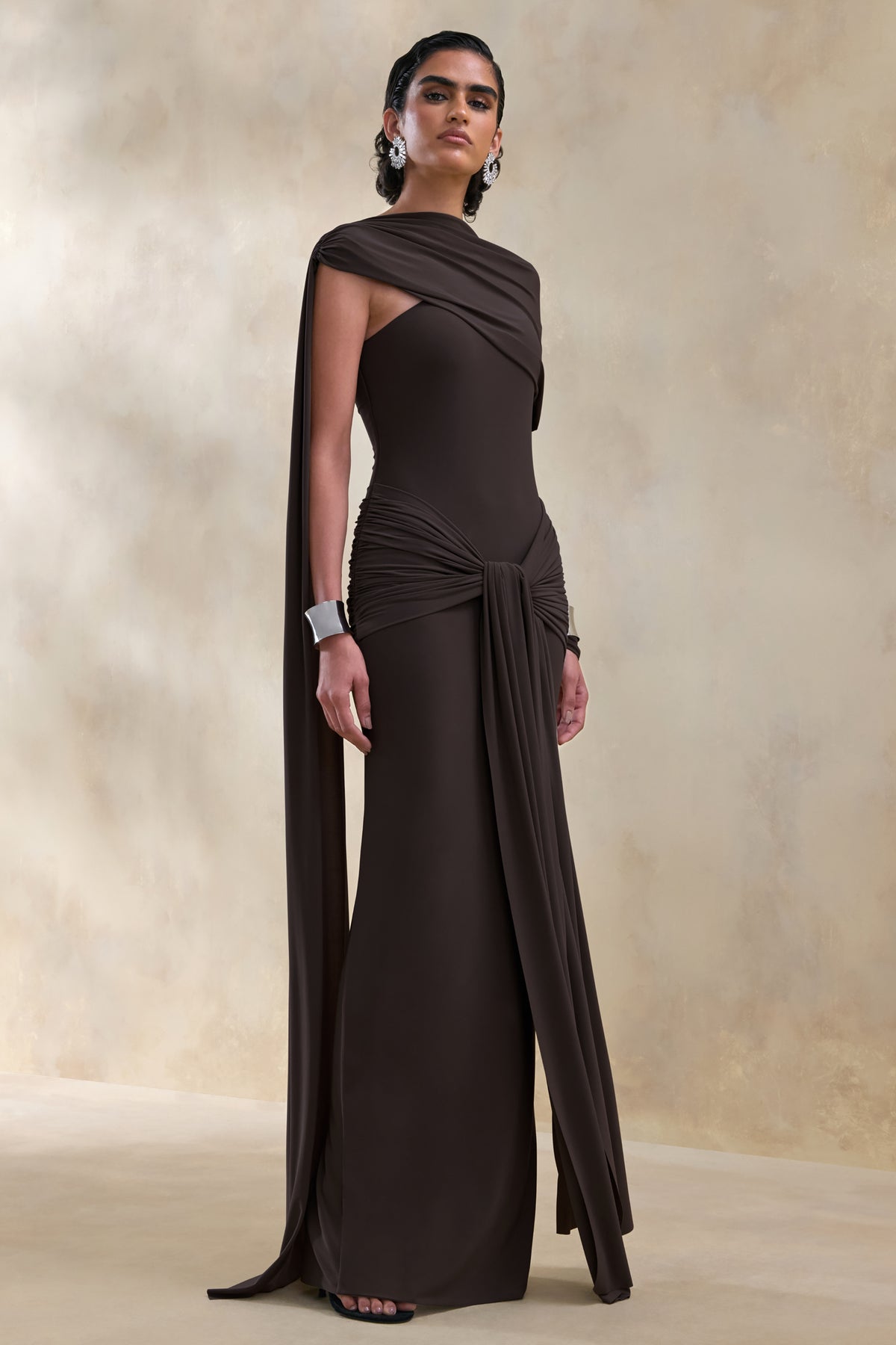 ECM_HR_CL137653022---Trisara-_-Brown-Asymmetric-Neck-Maxi-Dress-With-Gathered-Detailing-And-Sash-1.jpg