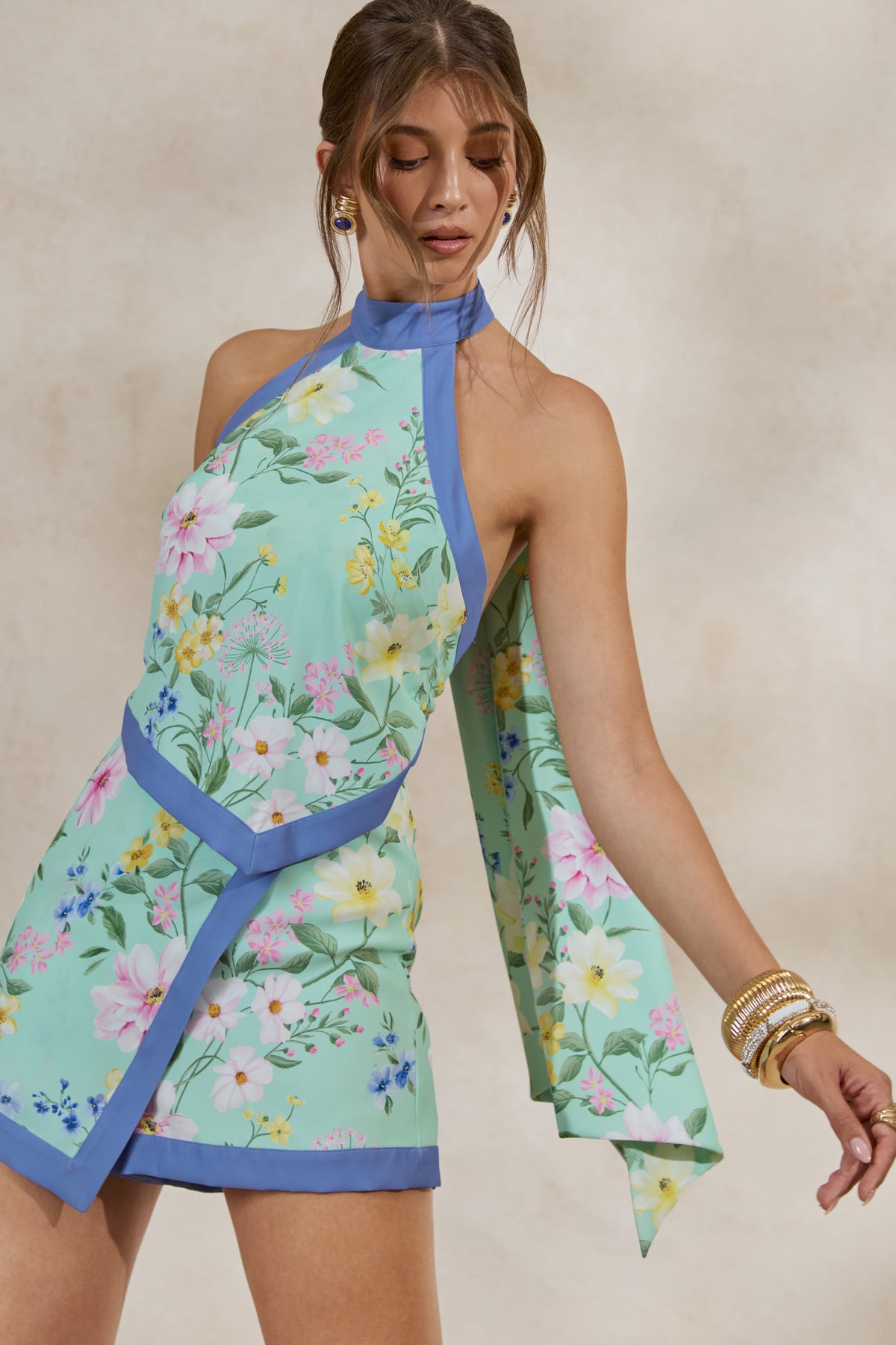 ECM_HR_CL138207032---Maritza-_-Mint-Floral-Halter-Neck-Asymmetric-Playsuit0.jpg