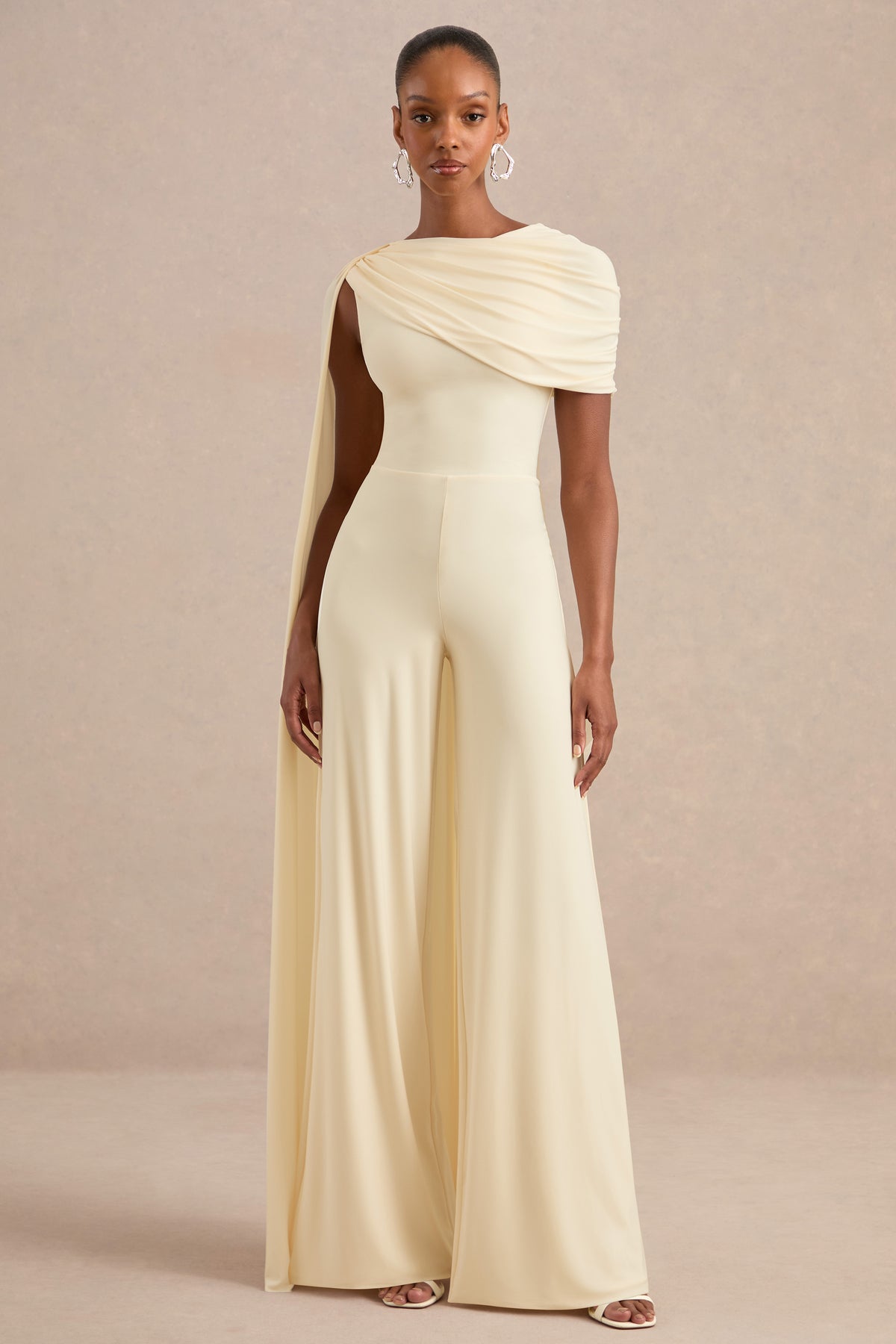 ECM_HR_CL138262111 - Emelisse Cream Round-Neck Jumpsuit With Gathered Detailing And Sash0.jpg