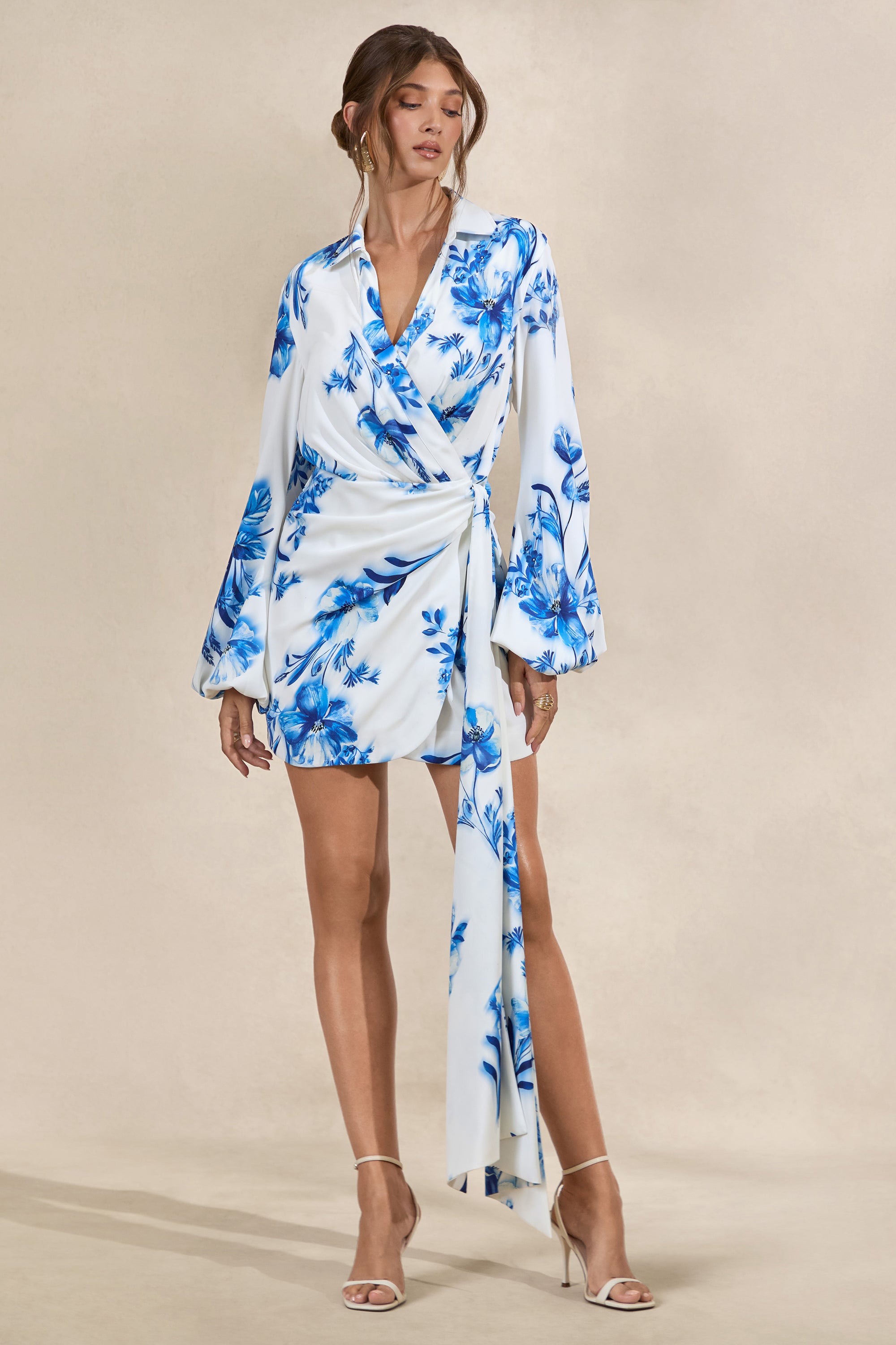 CL138569153 - Itzara _ Blue Floral Print Plunge-Neck Wrap Dress With Belt Detail1.jpg