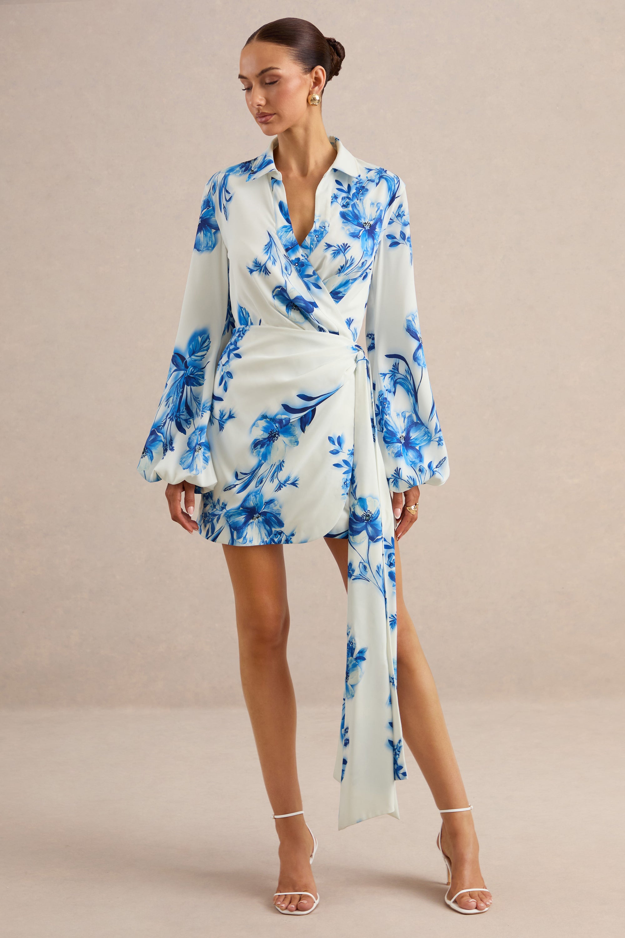 ECM_HR_CL138569153 - Itzara | Blue Floral Print Plunge-Neck Wrap Dress With Belt Detail 0.jpg