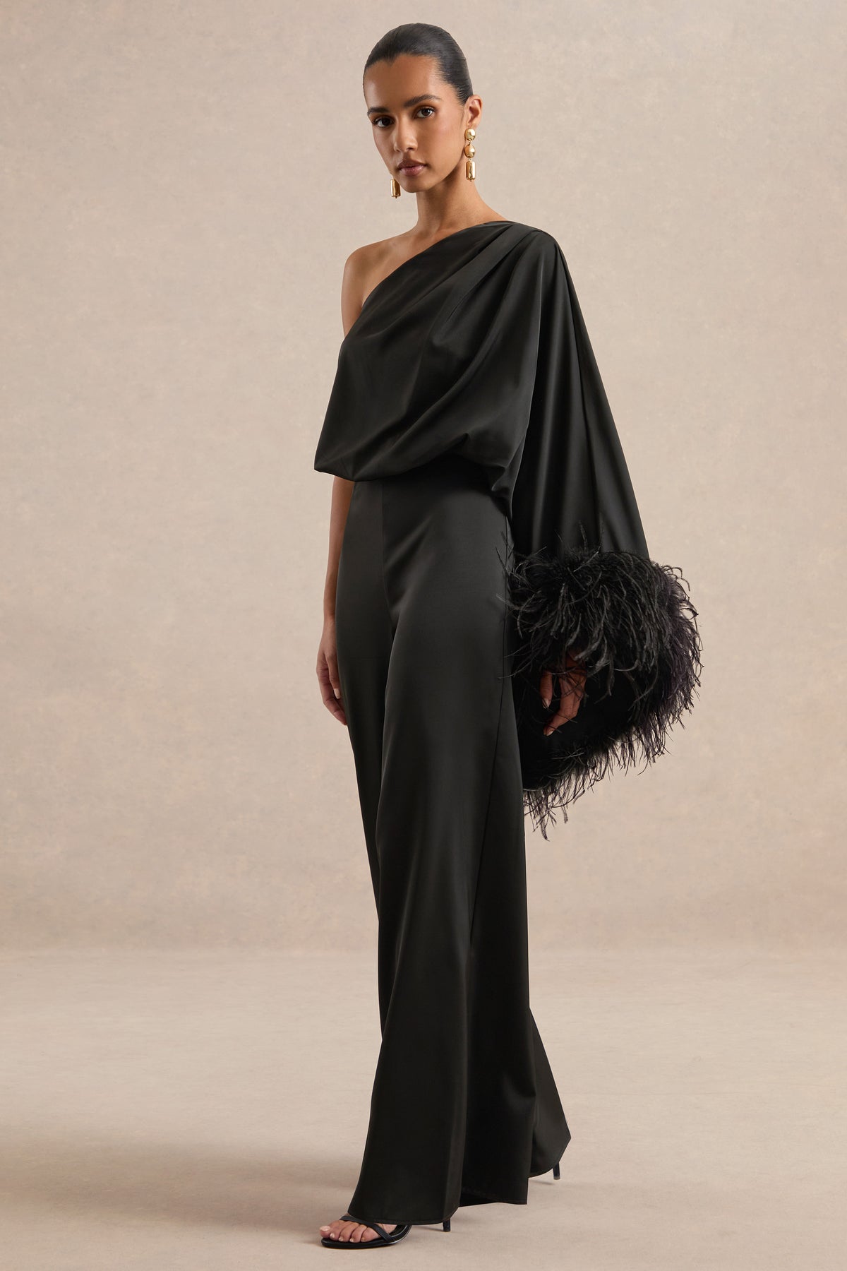 ECM_HR_CL139182001 - Jacinta _ Black Satin One Shoulder Long Sleeve Jumpsuit With Feather Detailing1.jpg
