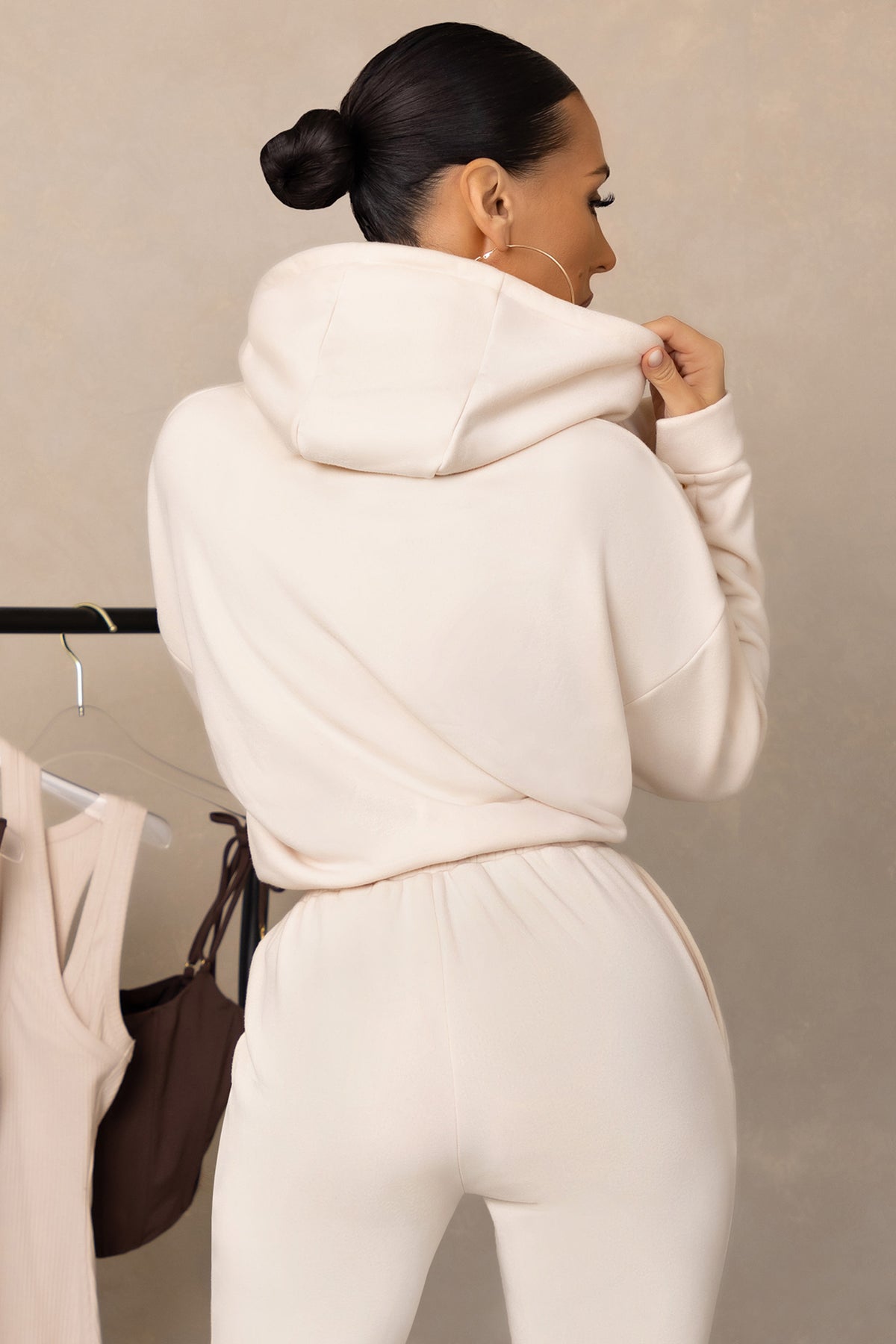 Kylie Jenner: White Hoodie, Lace-Up Pumps