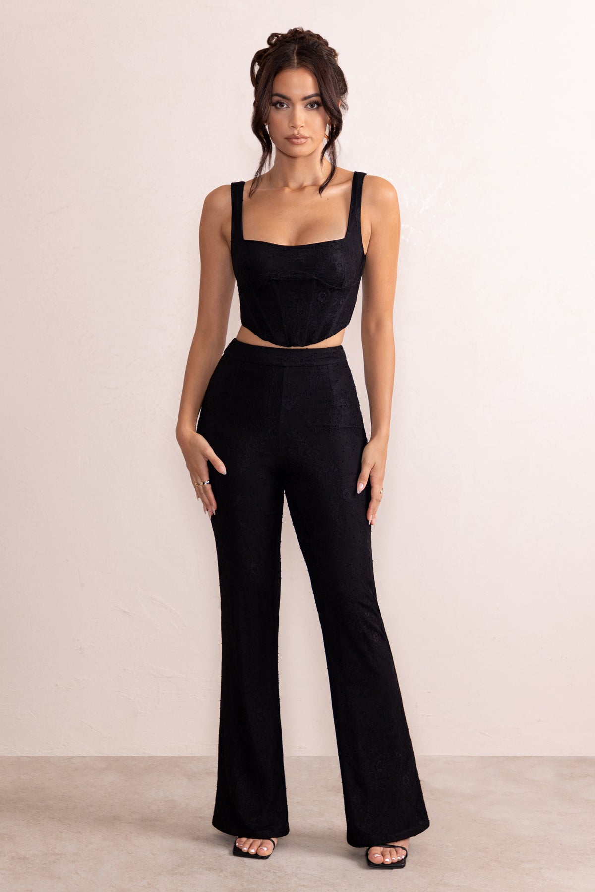 https://clubllondon.com/cdn/shop/products/CL128055-AdaBlackLaceOverlayFlaredTrousers1_1200x.jpg?v=1666715206